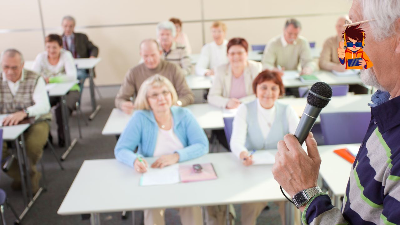 An older adult speaking into a microphone in a classroom setting, addressing a group of senior learners seated at desks with notebooks and pens. The image conveys the concept of lifelong learning and emphasizes that education is accessible at any age.