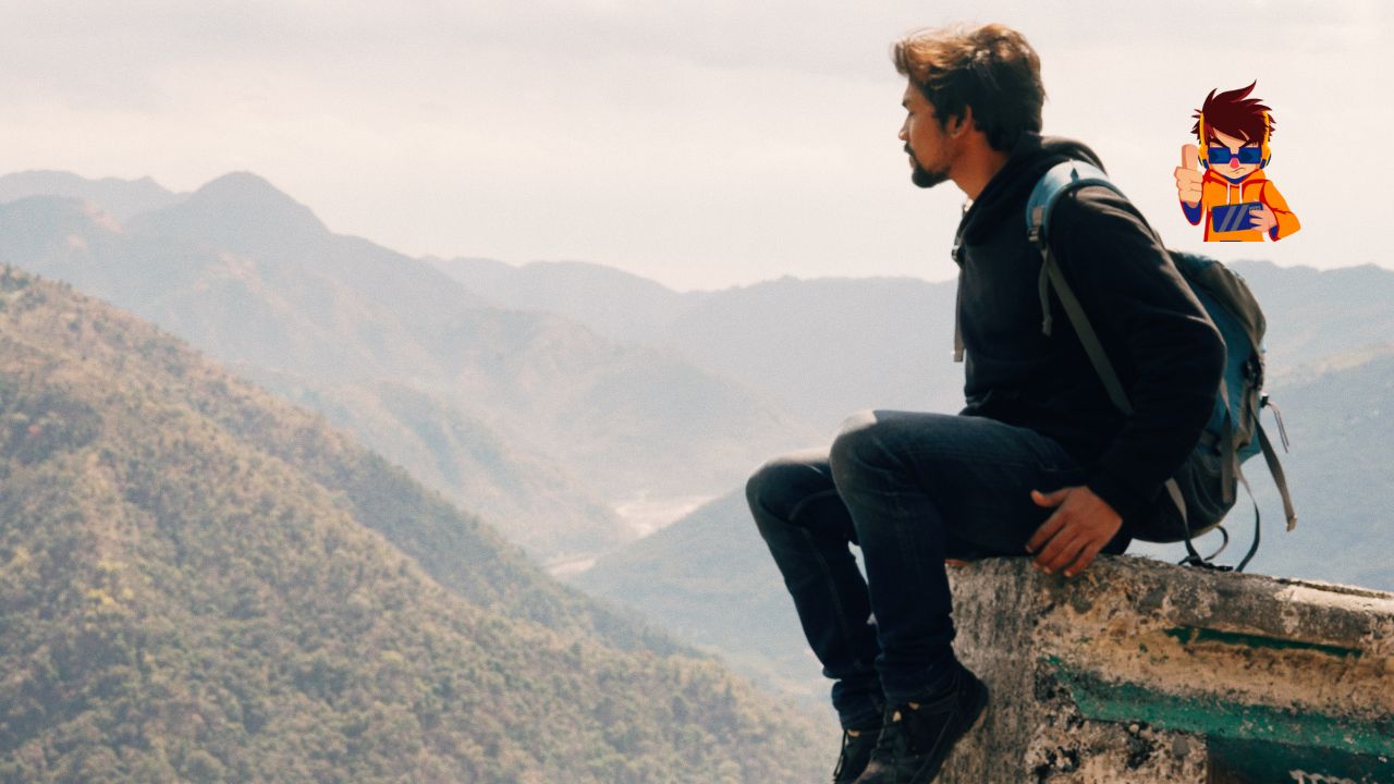 A man with a backpack sitting on a ledge overlooking a scenic mountain range, gazing into the distance. The image conveys the spirit of adventure and introspection often associated with solo travel.